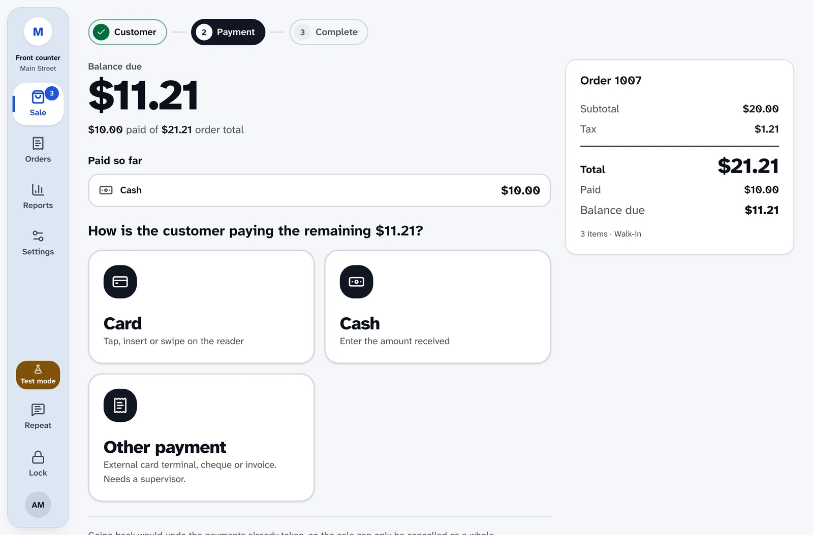 The payment step of checkout. $10.00 has been paid in cash, the balance due is $11.21, and the register asks “How is the customer paying the remaining $11.21?” with Card, Cash and Other payment choices.